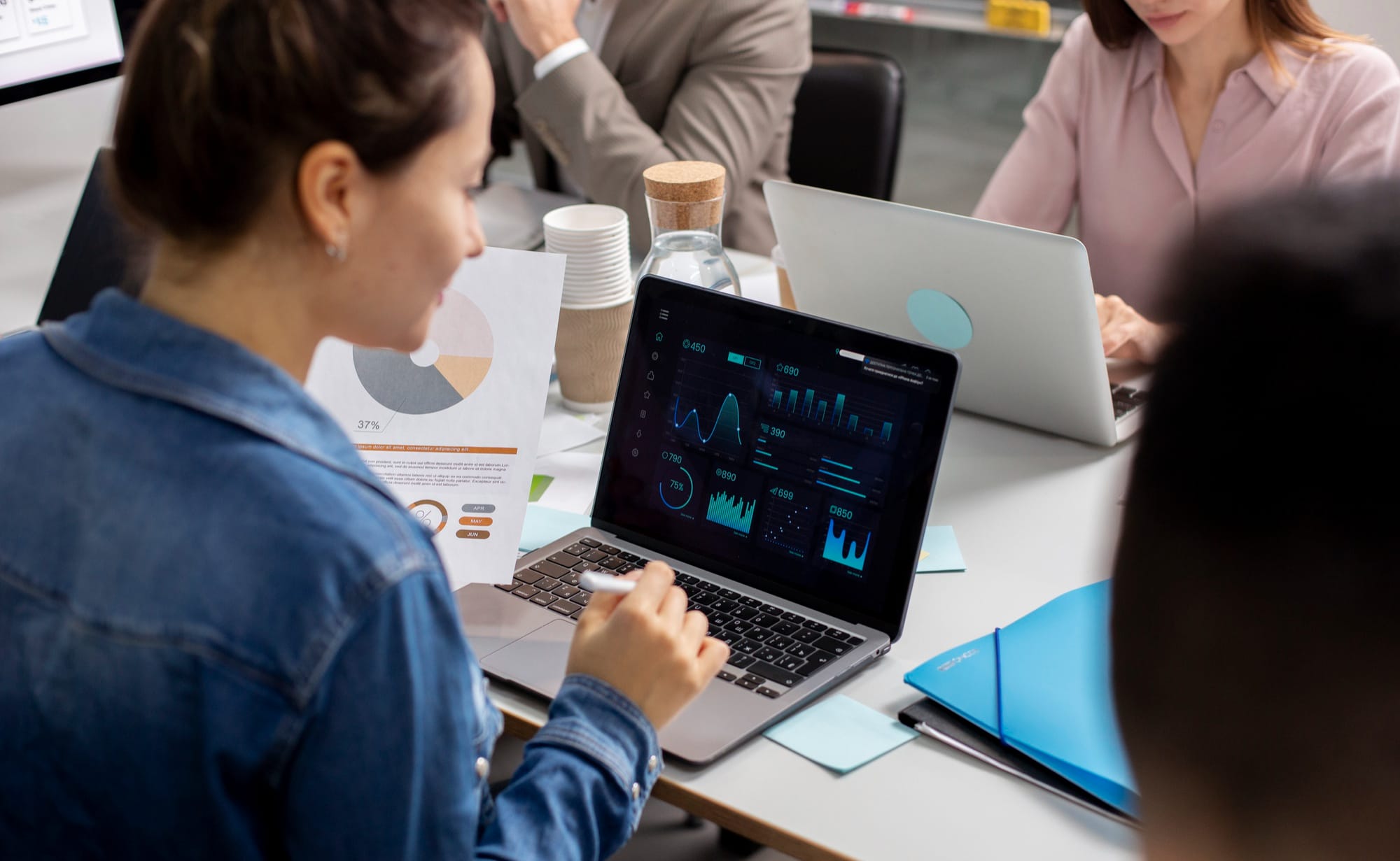 Developer reviewing AI-powered property analytics dashboard and real estate API data on a laptop, showcasing Homesage.ai integration features.