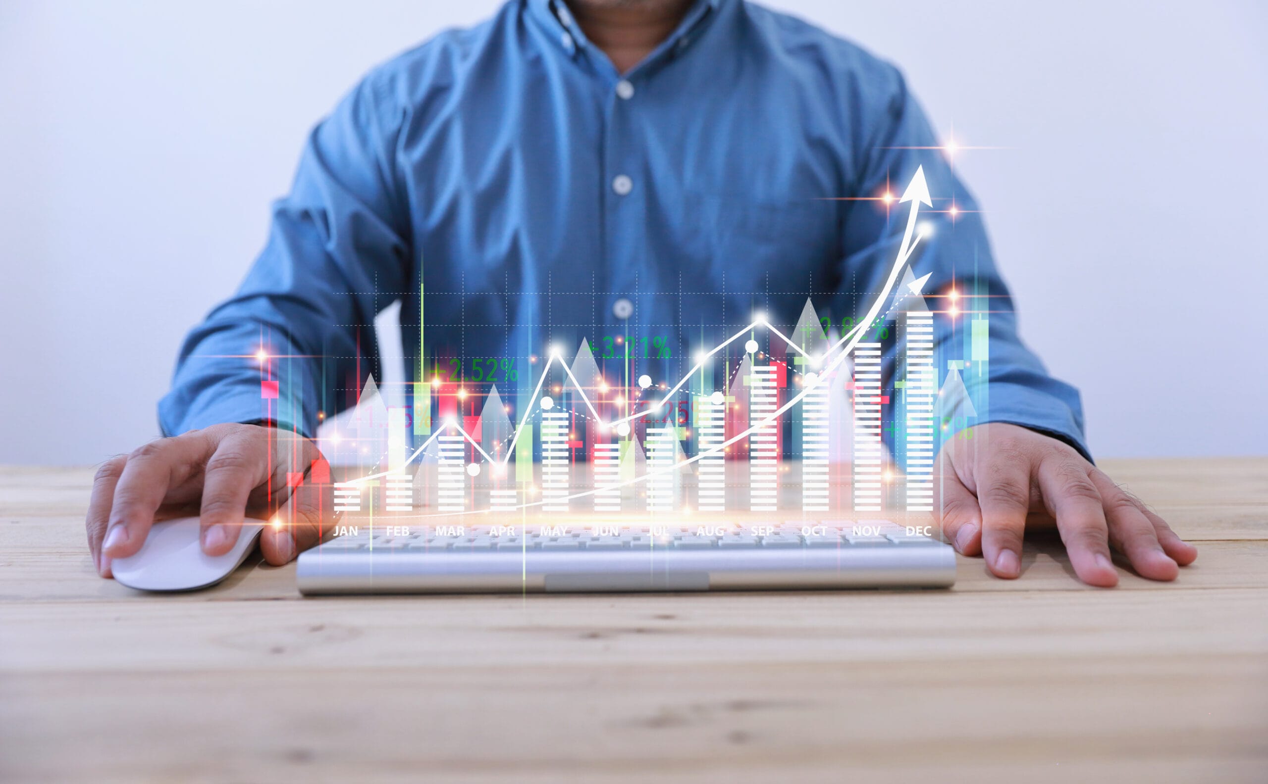 Professional real estate investor analyzing property charts showing growth trends on laptop, pondering Flip or Rent investment strategy decision.