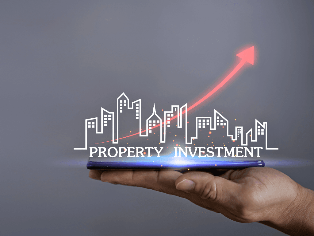 Hand holding a smartphone with digital city skyline and upward arrow, representing property investment growth and technology in properties investing