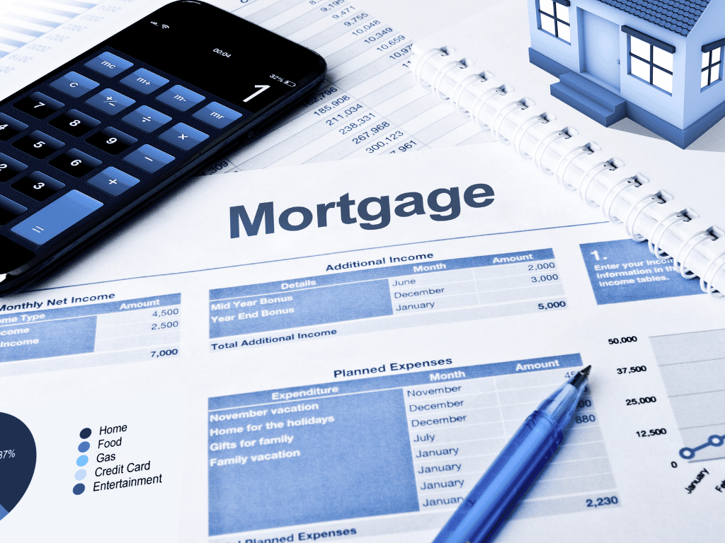 6 Best AI Real Estate Analytics Tools 4 Mortgage documents with financial charts, a calculator, a pen, and a small model house representing home loan planning.