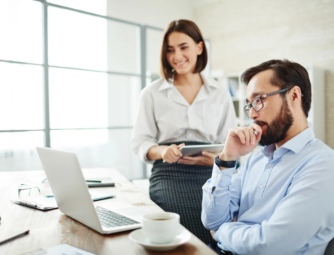 5 Ways AI Finds Distressed Properties 2026 4 Real estate investors using AI technology to analyze distressed property opportunities