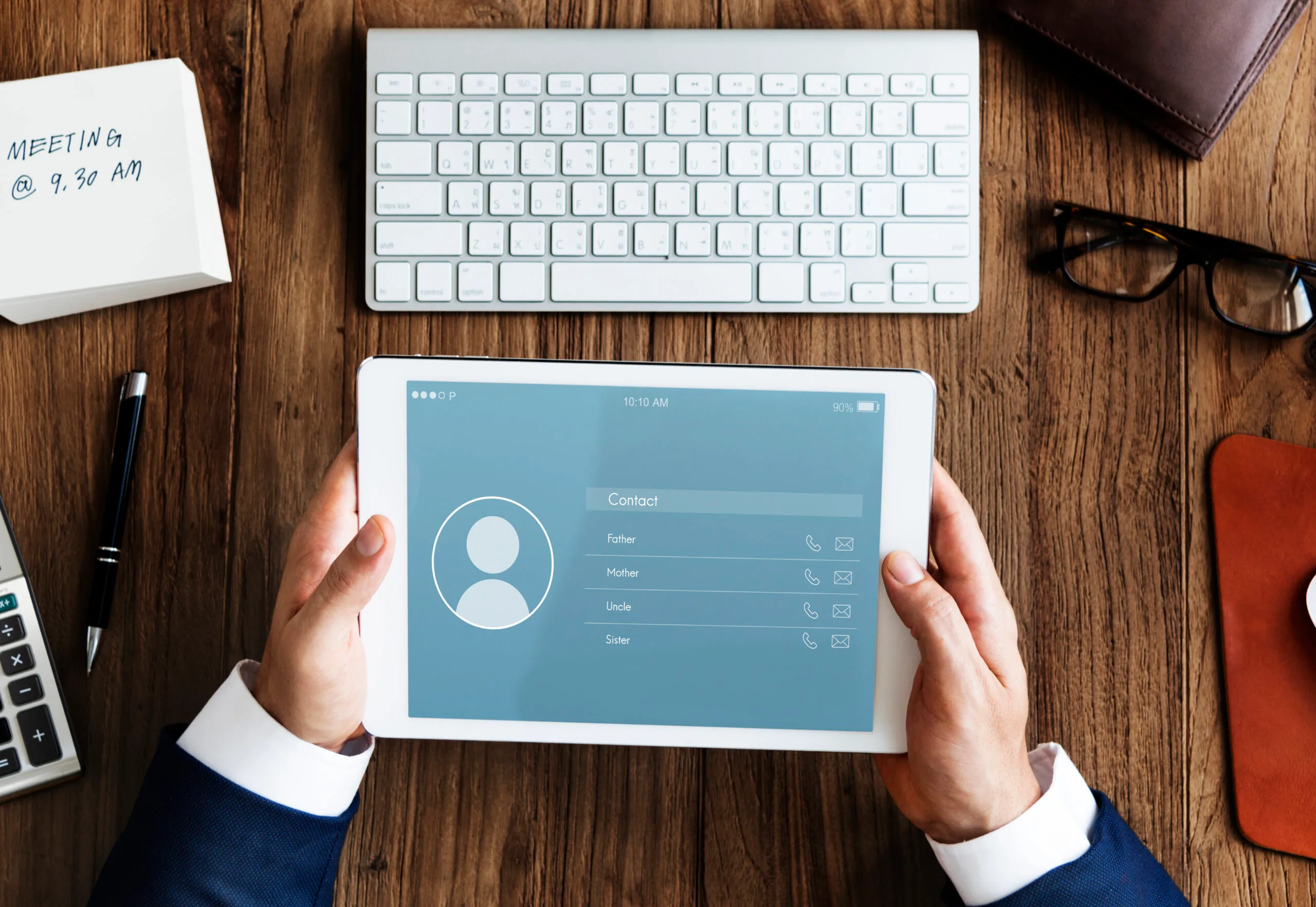 real estate investor reviewing property owner contact data on tablet