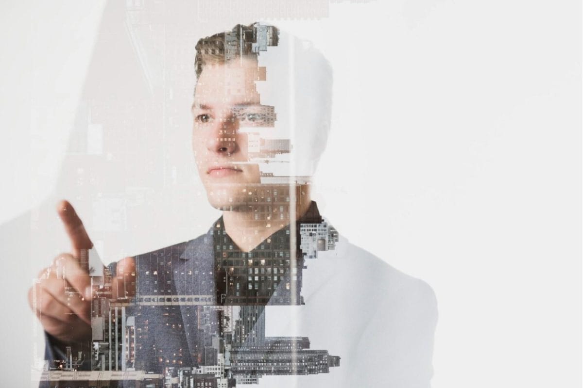 Professional analyzing AI algorithms in real estate with a futuristic urban overlay